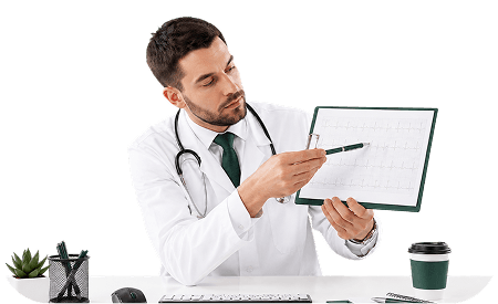 Physician reviewing a patient's health chart at his desk